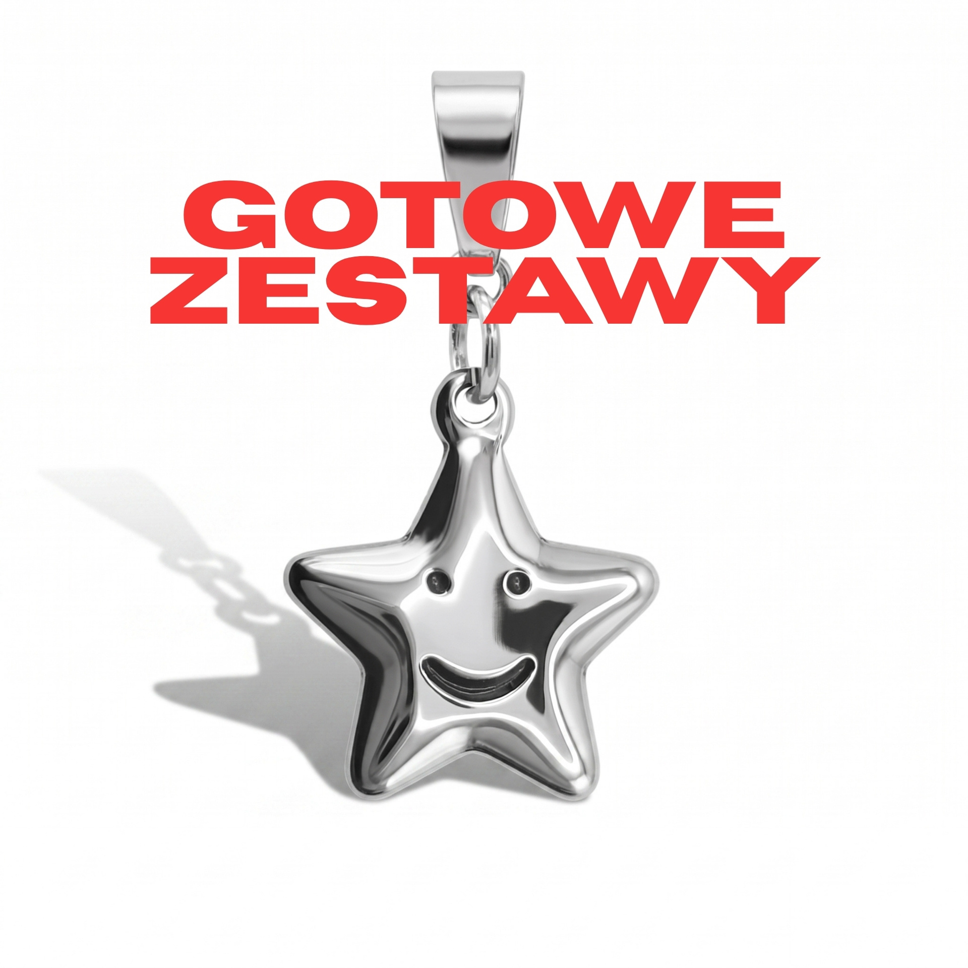 Srebrna zawieszka w kształcie uśmiechniętej gwiazdki z napisem Gotowe zestawy